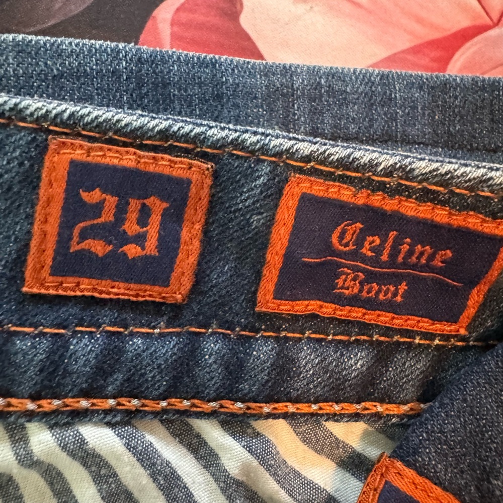 Size 29 boot cut rock revival jeans.